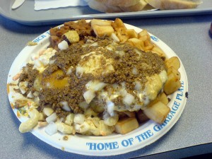 The Nick Tahou Garbage Plate with baked beans and a fried egg